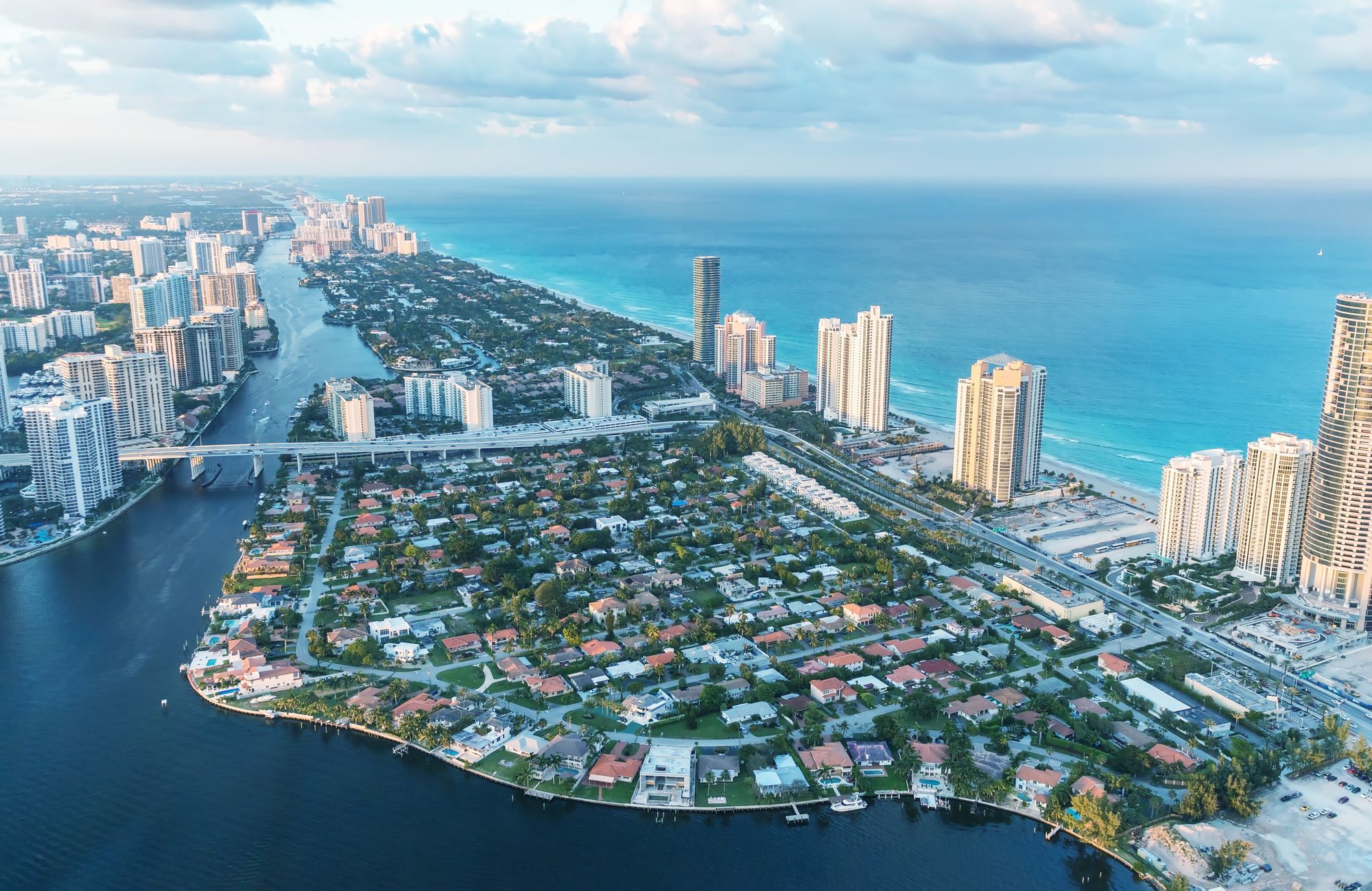 Aerial view of Miami with skyscrapers facing the ocean - KILROY