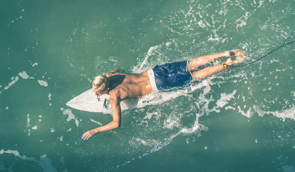 surfing-surfer-paddling-aerial-cover