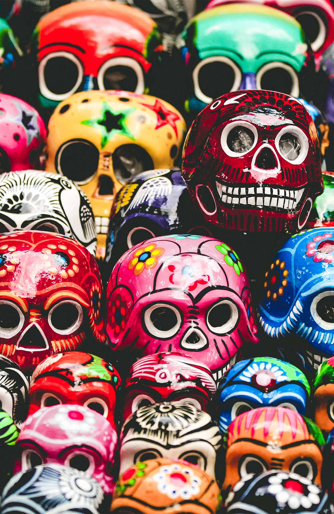 Close-up image of colourful painted skulls in Mexico - KILROY