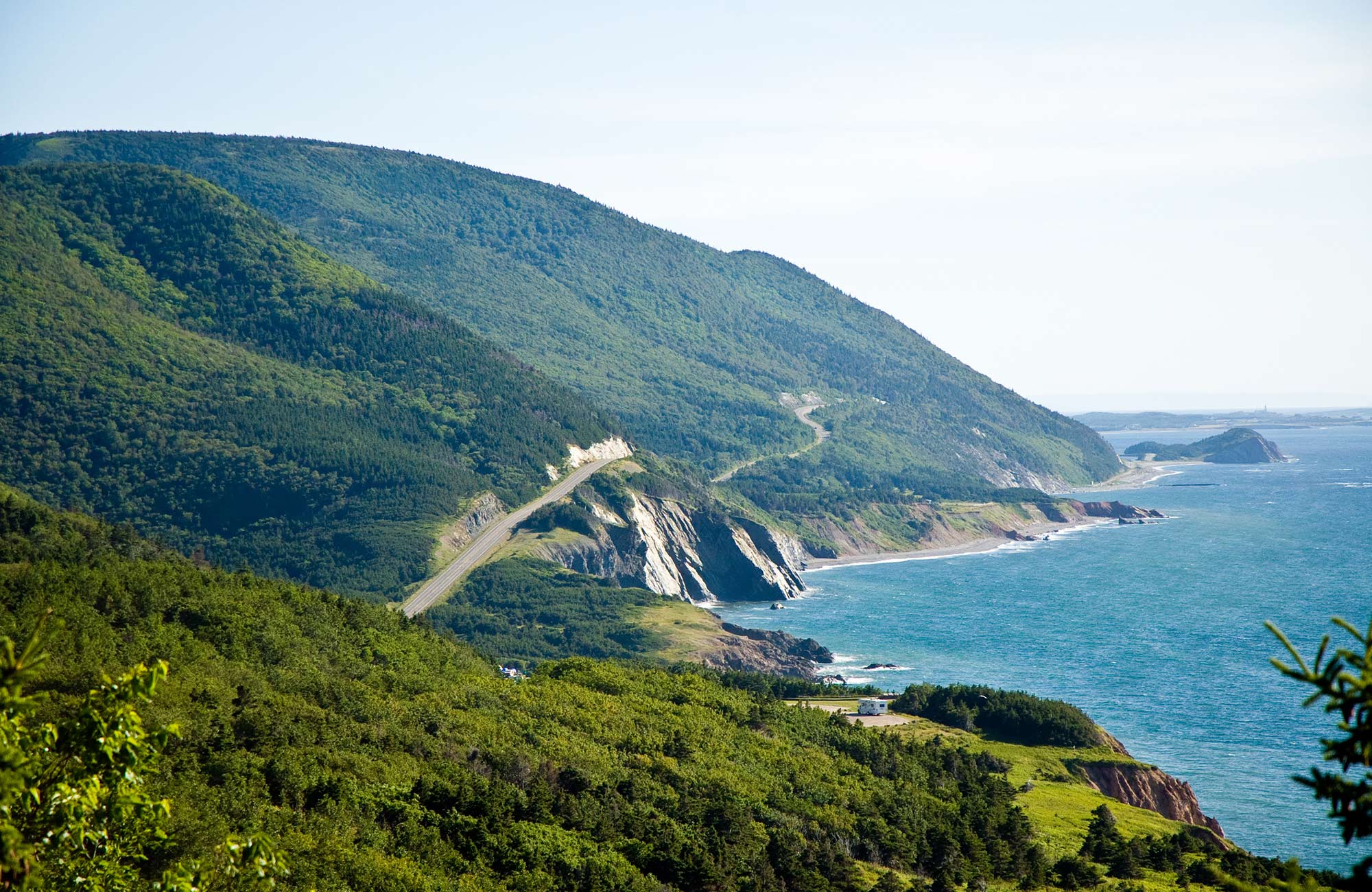 Image of a road snaking along the coast of Canada - KILROY