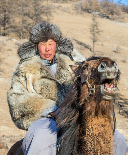 Image of a Mongolian man on a horse - KILROY