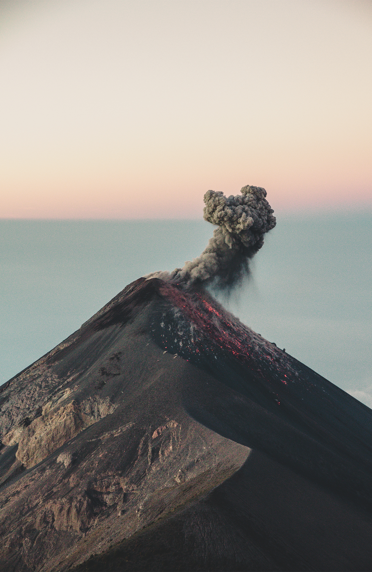 Image of black smoke billowing from Acatenango volcano in Guatemala - KILROY