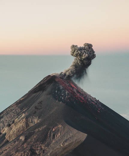 Image of black smoke billowing from Acatenango volcano in Guatemala - KILROY