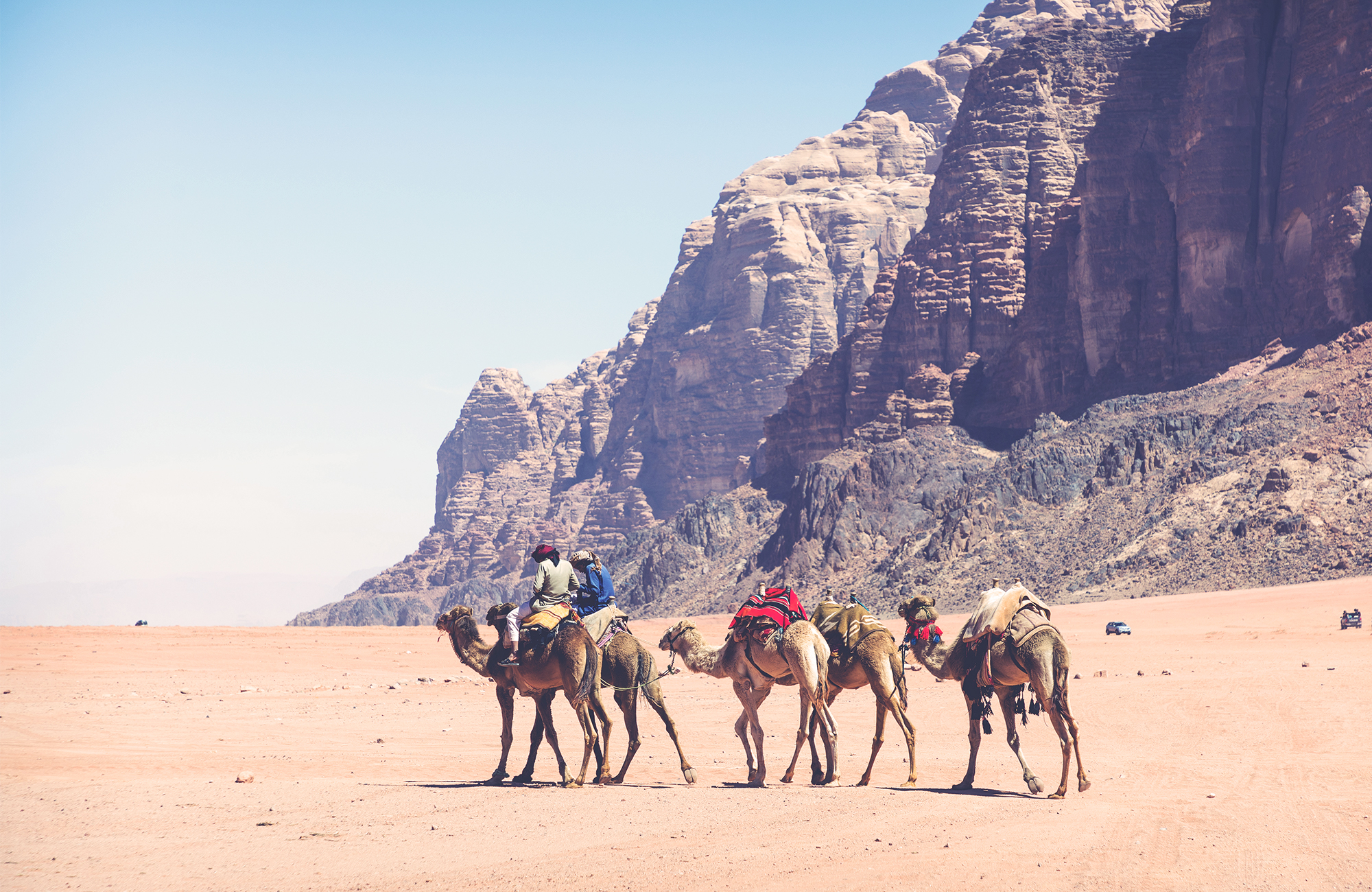 Image of a caravan of camels in Wadi Rum in Jordan - KILROY
