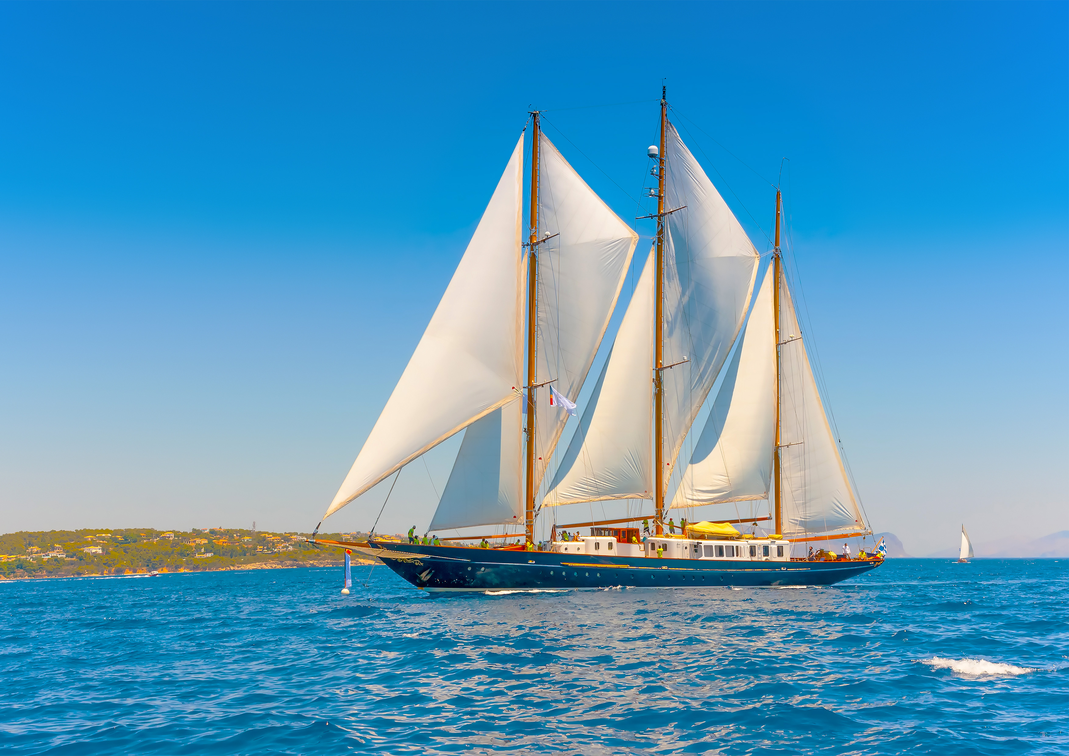 Image of a traditional sail boat with big sails - KILROY
