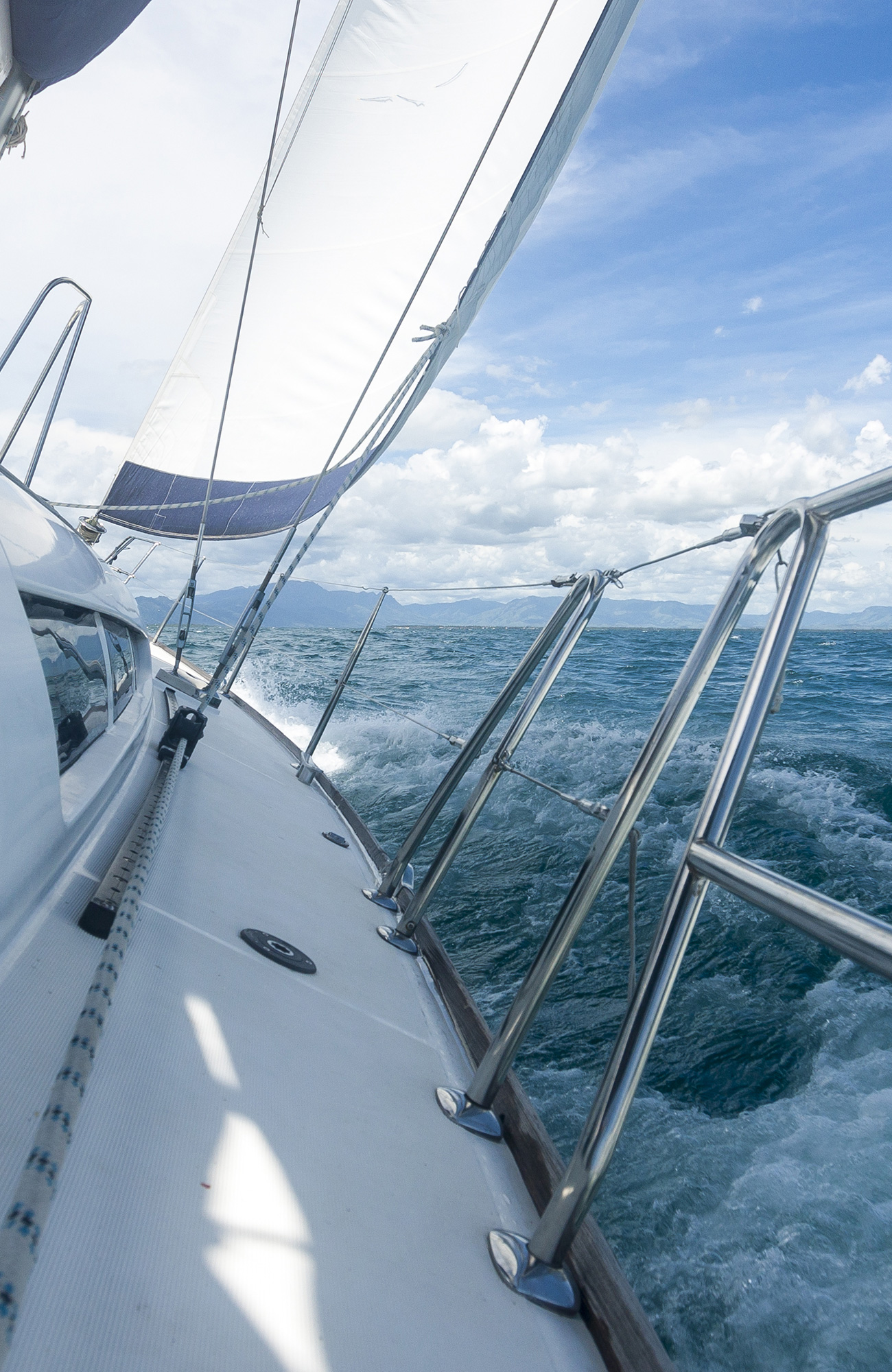 Image from a sailing boat as it cruises across choppy waters - KILROY