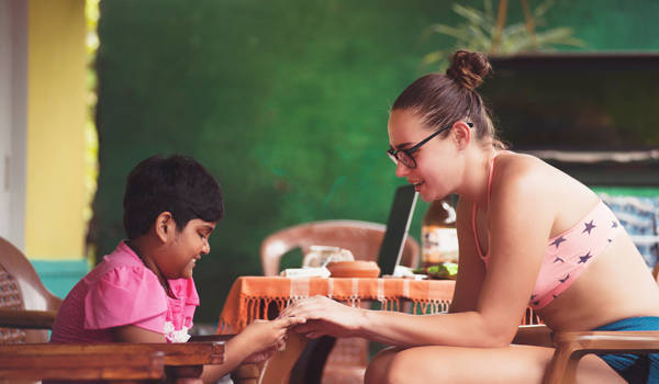 volunteering-child-woman-cover