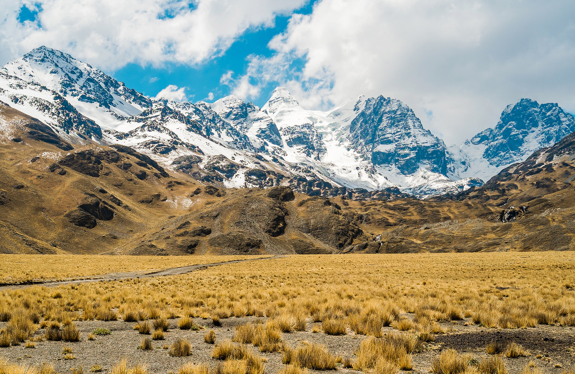 Image of a snowcapped mountain range in Bolivia - KILROY