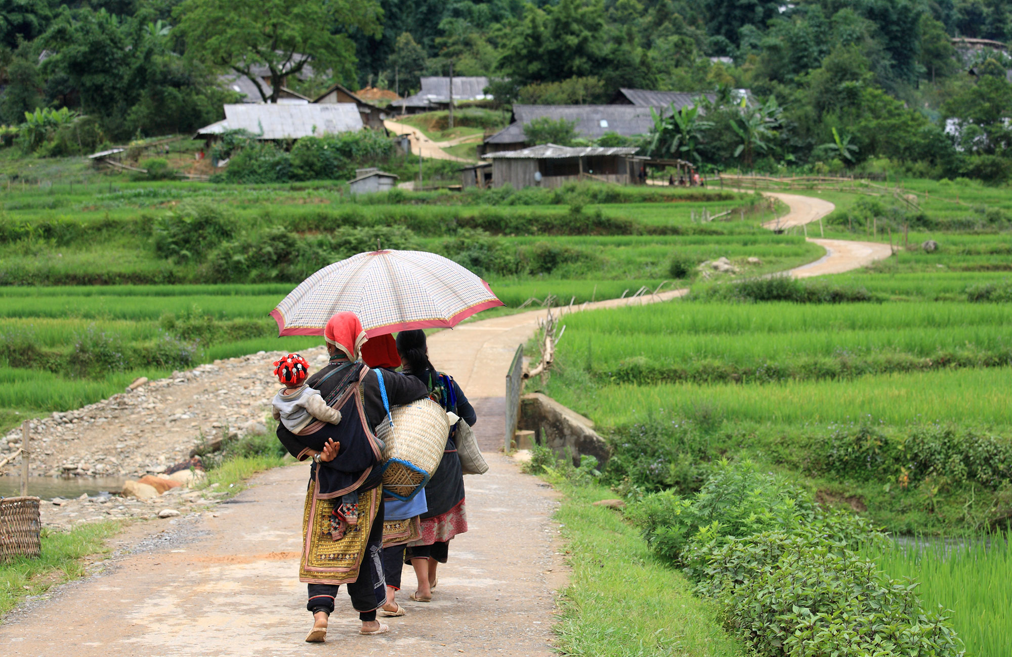 Image of hill tribe women walking in northern Vietnam - KILROY