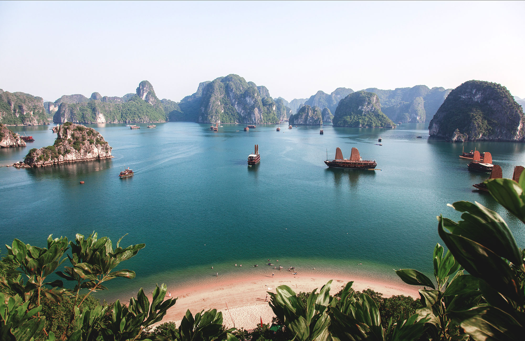 Image of boats and karst islands at Halong Bay in Vietnam - KILROY