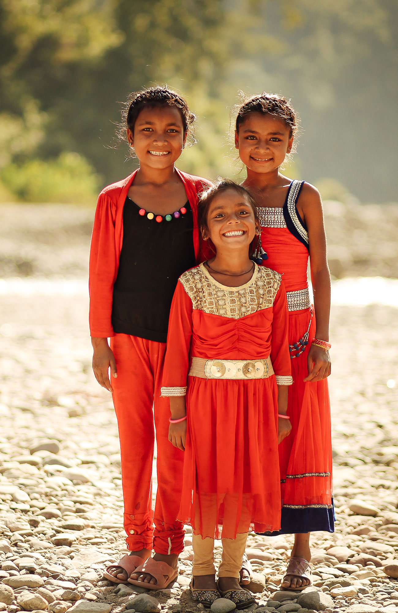 Image of young Nepalese children smiling at the camera - KILROY