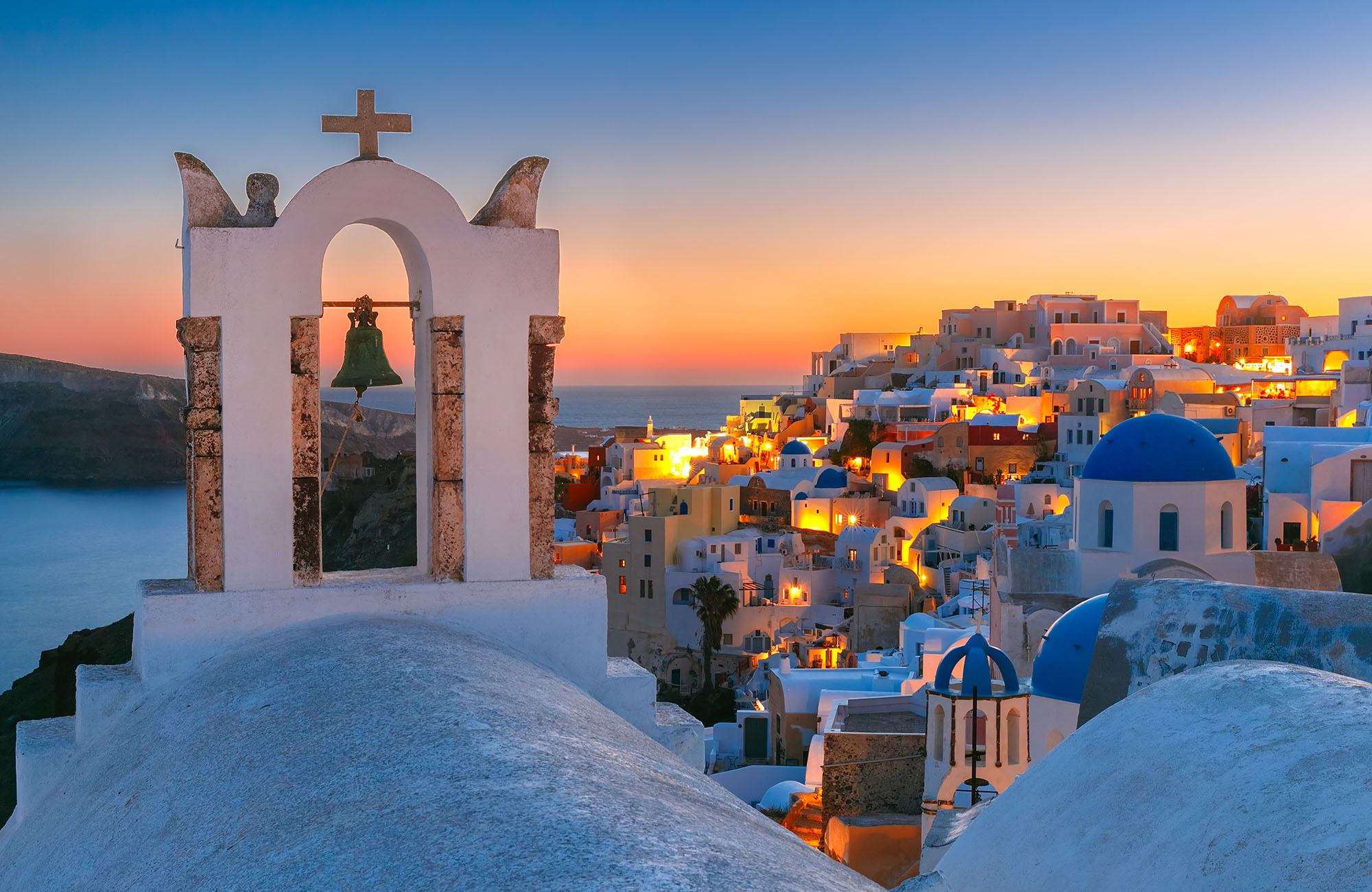 Image of the blue-domed rooftops of Santorini in Greece - KILROY