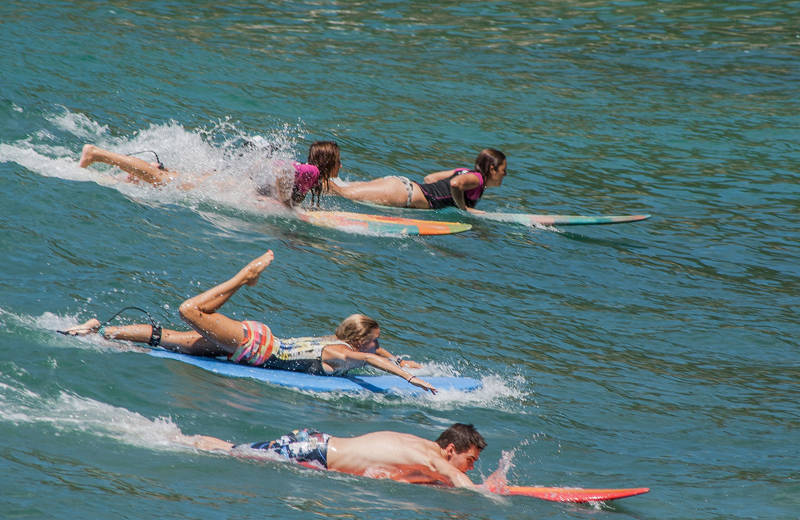 Image of students learning to ride the waves in Mexico - KILROY