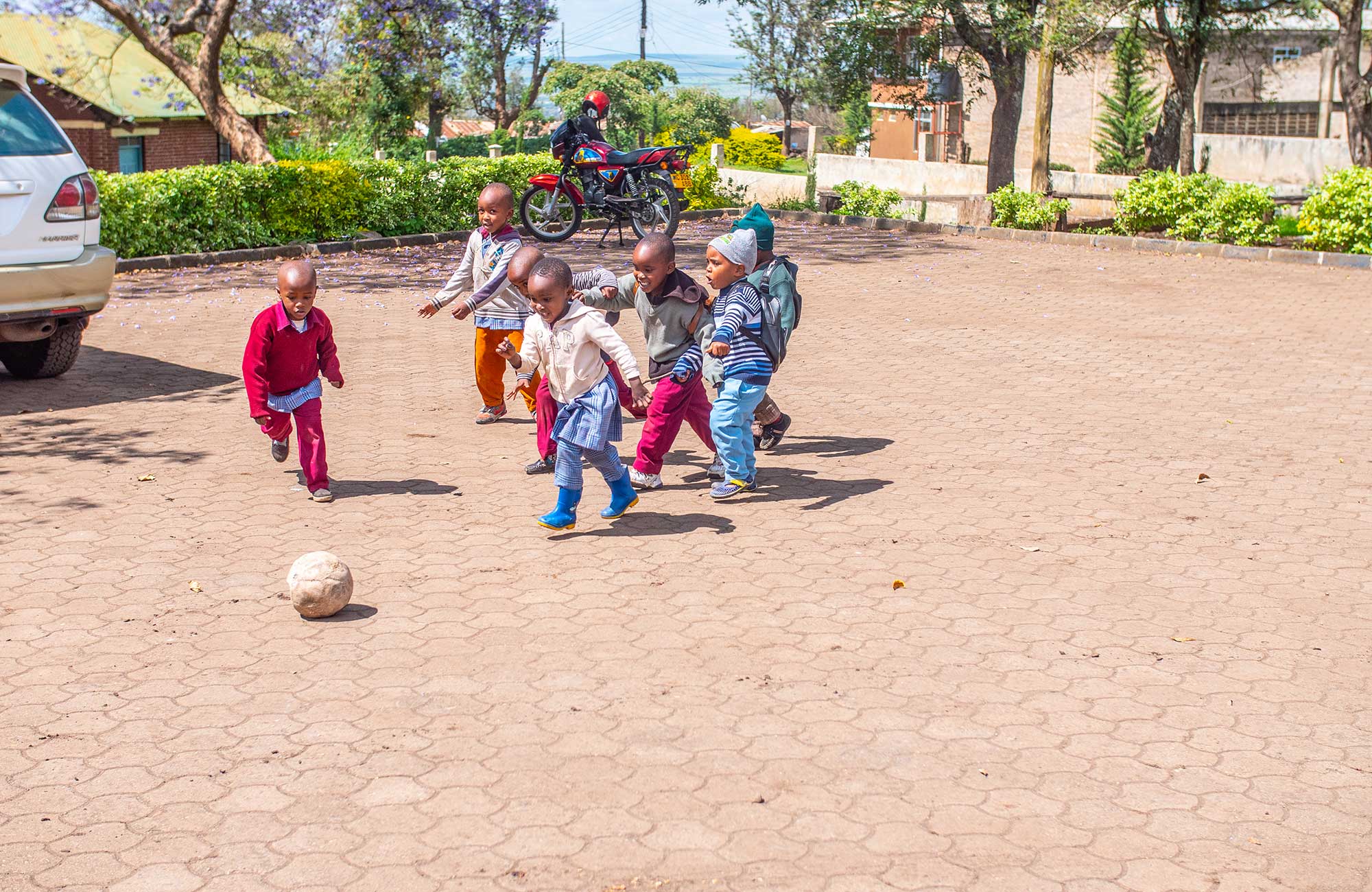 Image of children playing with a football at a volunteer project in Tanzania - KILROY