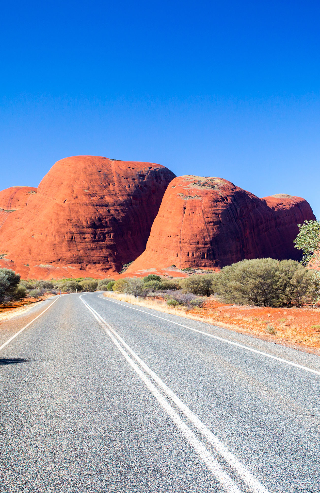 Image of a road in the Australian outback and a quintessential campervan hire destination - KILROY
