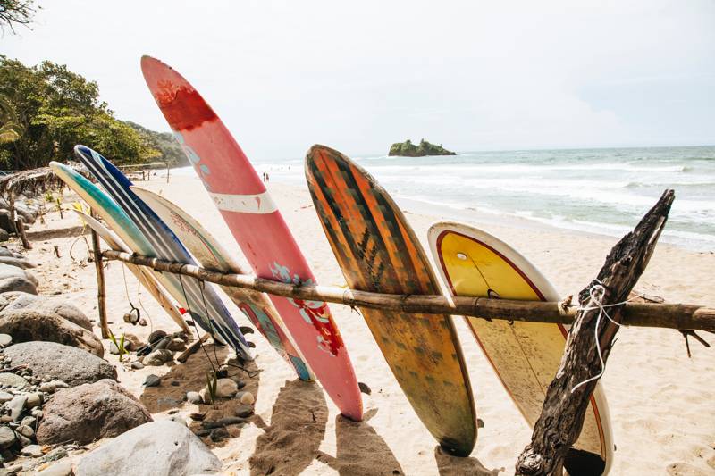 Surfboards on a sandy beach in Costa Rica