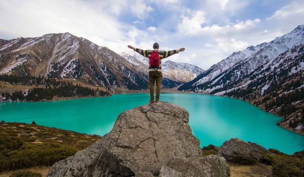 Kazakhstan Big Almaty Lake And Guy With Backpack Cover