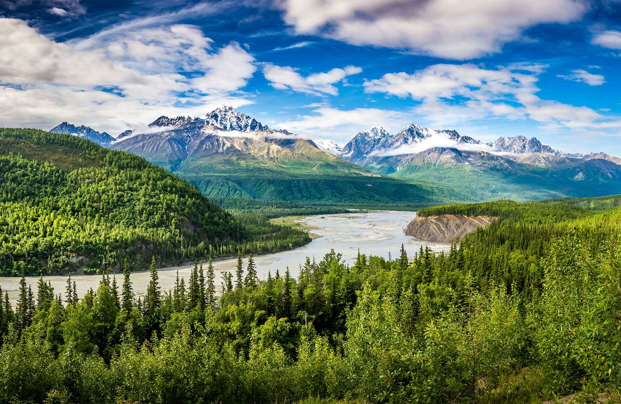 Image of a mountain, river and forest landscape in Alaska - KILROY
