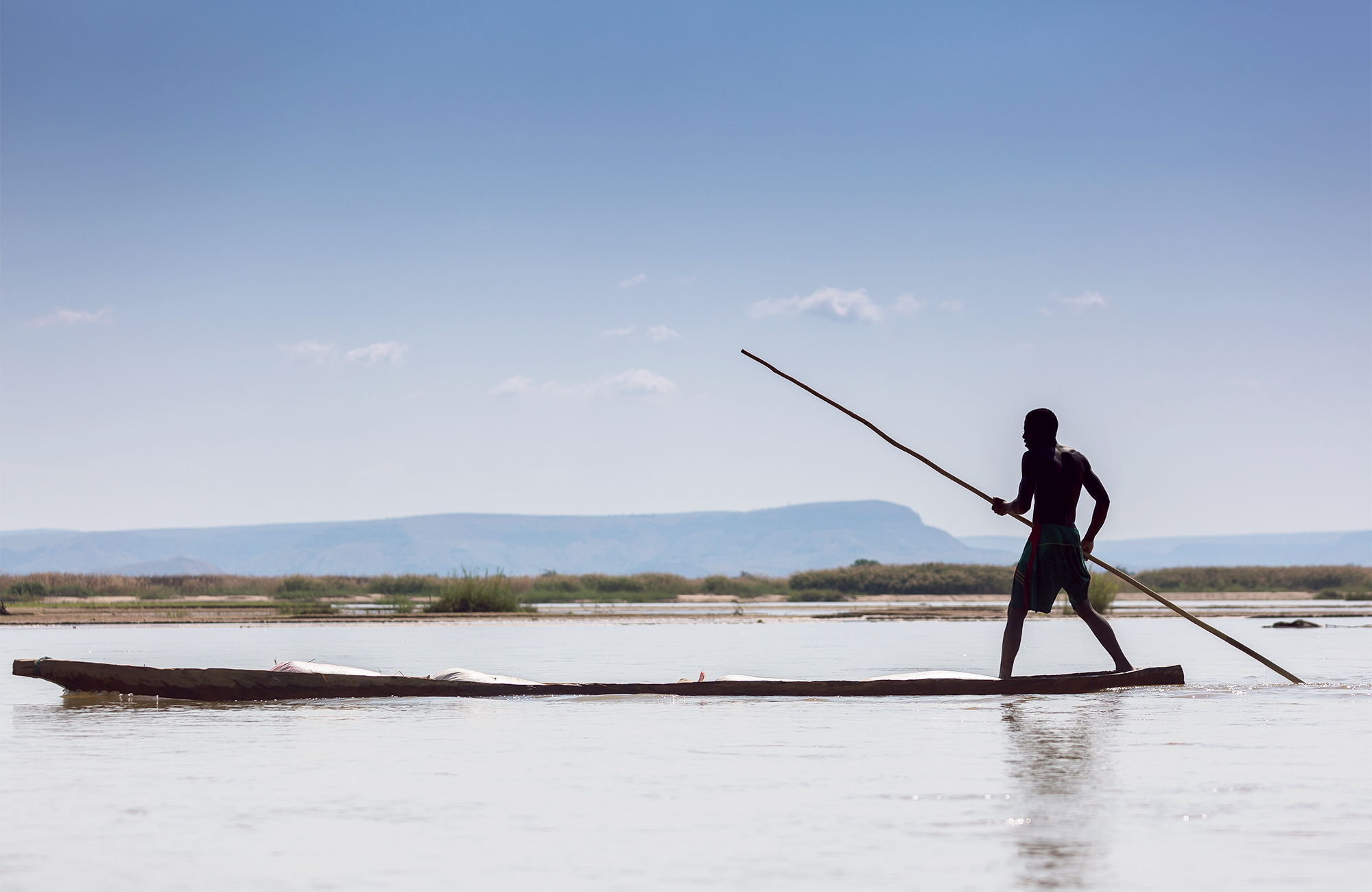 Image of a man on a traditional boat in Madagascar - KILROY