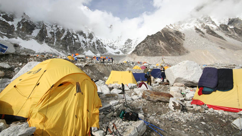 Image of tents set up at Everest Base Camp in the Himalayas in Nepal - KILROY