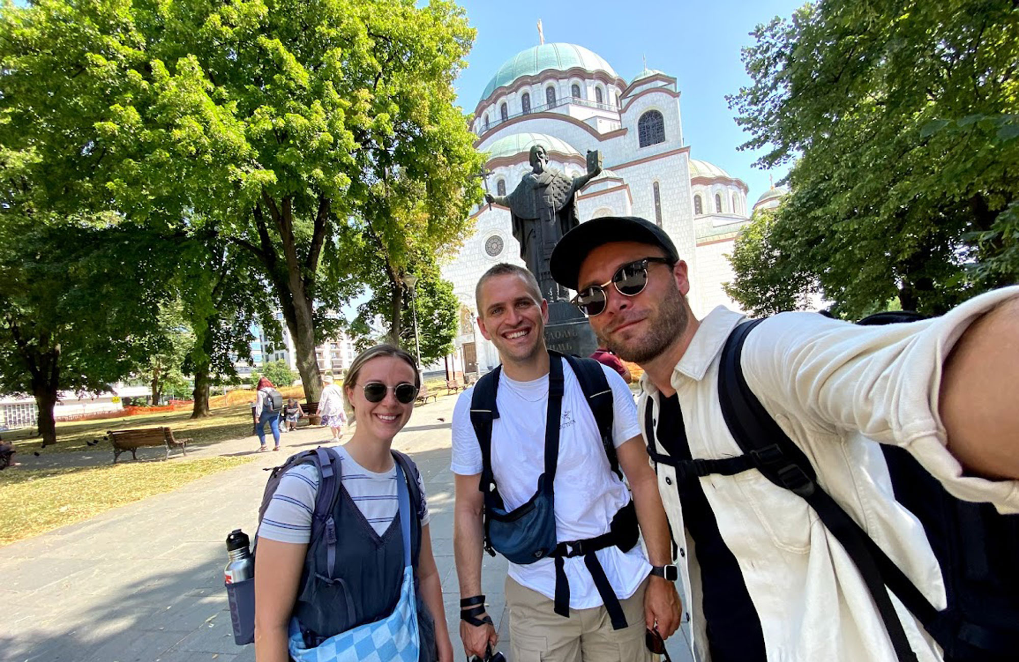 Image of a group of travellers in front of a church in Albania - KILROY
