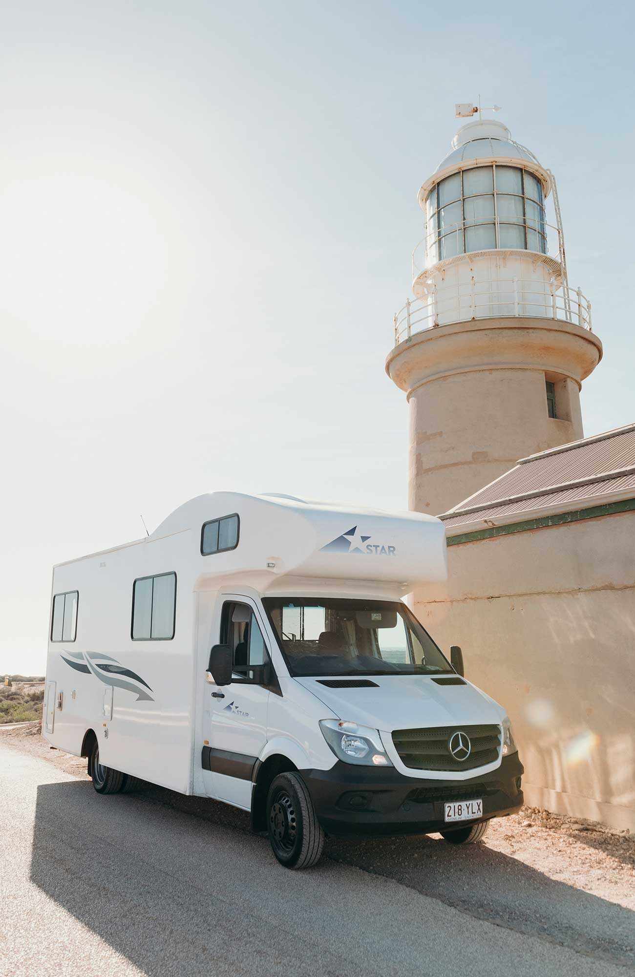 Image of the Star RV Polaris 6 campervan beside a lighthouse in Australia - KILROY