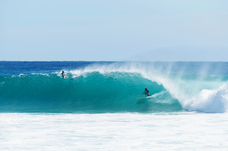 Surfers Braving Big Waves At Kirra In Queensland, Australia