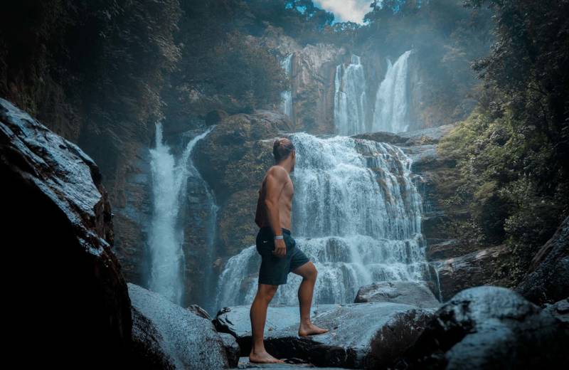 Traveller at Nauyaca waterfalls in the south of Costa Rica