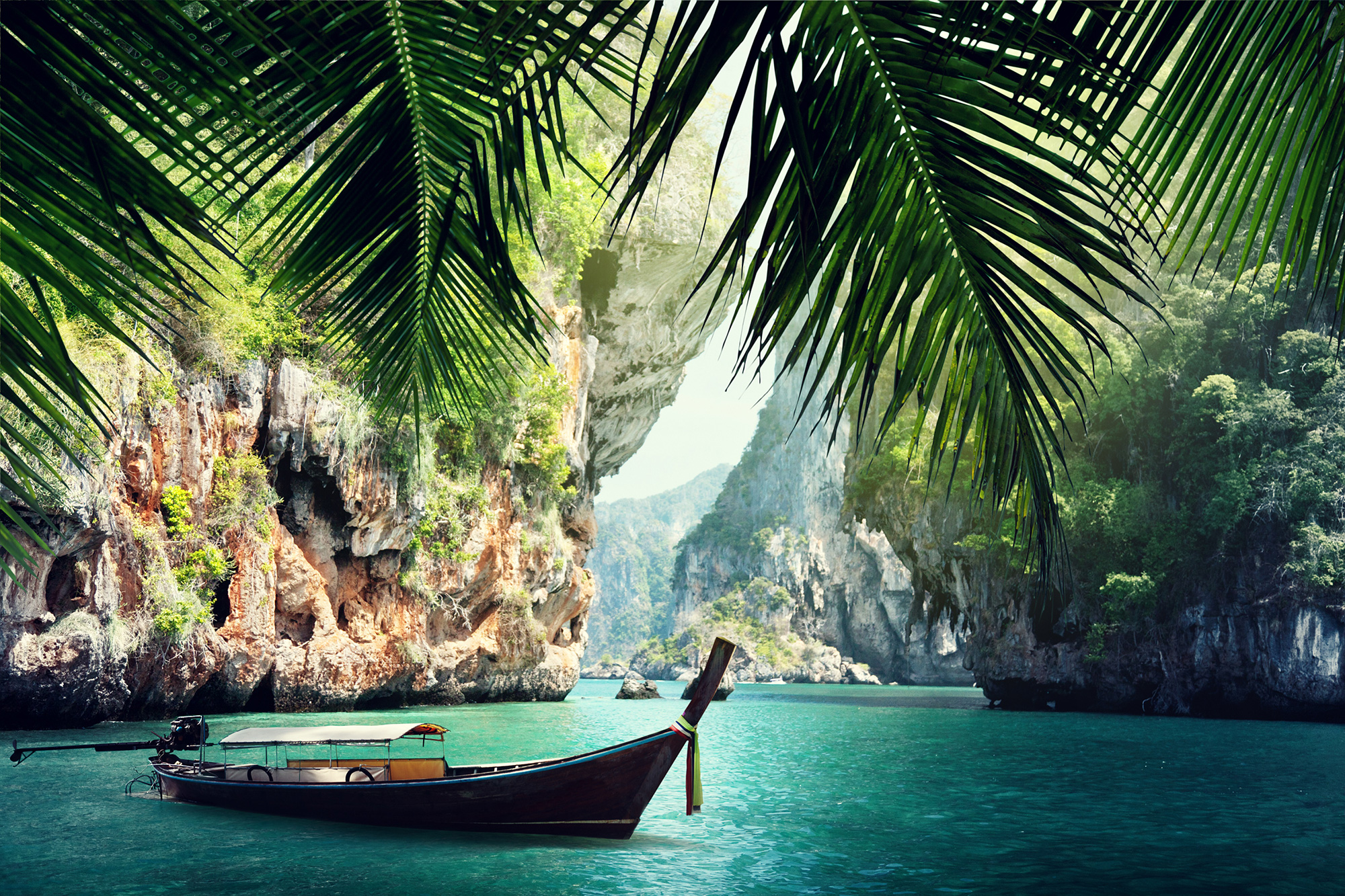 Image of a traditional longboat near Krabi in Thailand - KILROY