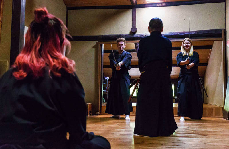 Travellers partaking in Samurai training in Japan