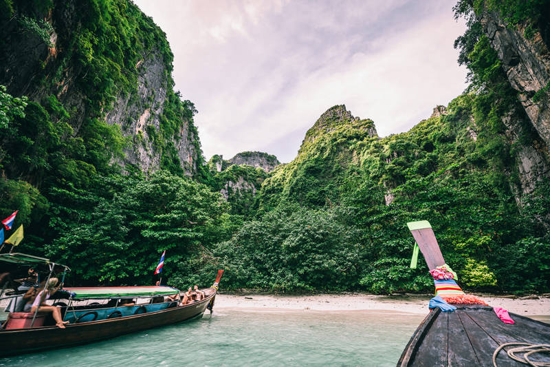 Boats at a beach on the Phi Phi Islands in Thailand