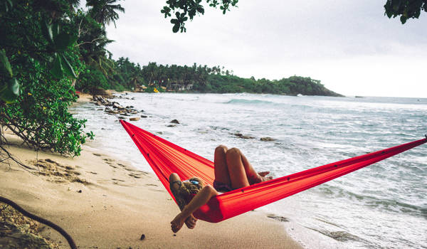 Girl In Hammock On A Beach